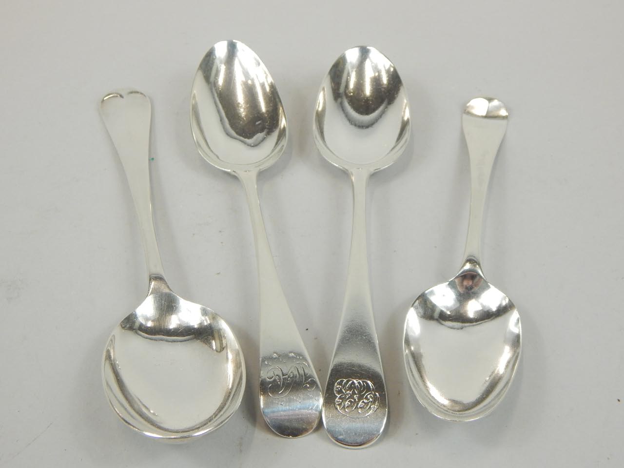 Appraisal: Three various George III silver table spoons Old English pattern