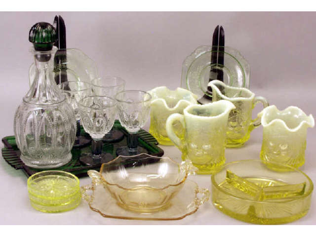 Appraisal: Collection of glass includes pressed clear and green decanter set