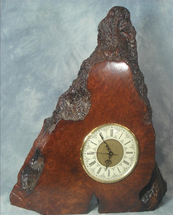 Appraisal: Redwood burl clock with quartz movement h Estimate -