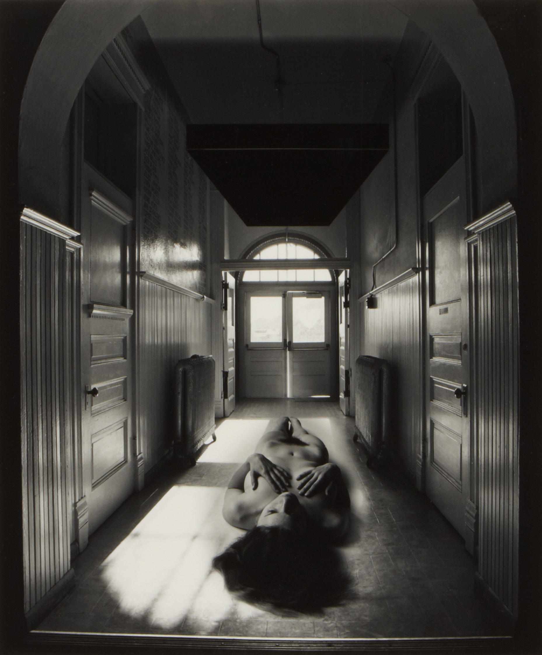 Appraisal: Jerry Uelsmann American born Untitled Reclining nude in hallway Gelatin