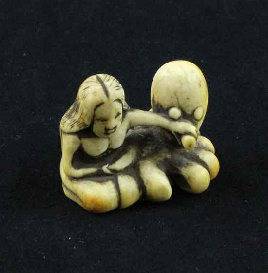 Appraisal: An Edo period ivory netsuke carved as a fishergirl holding