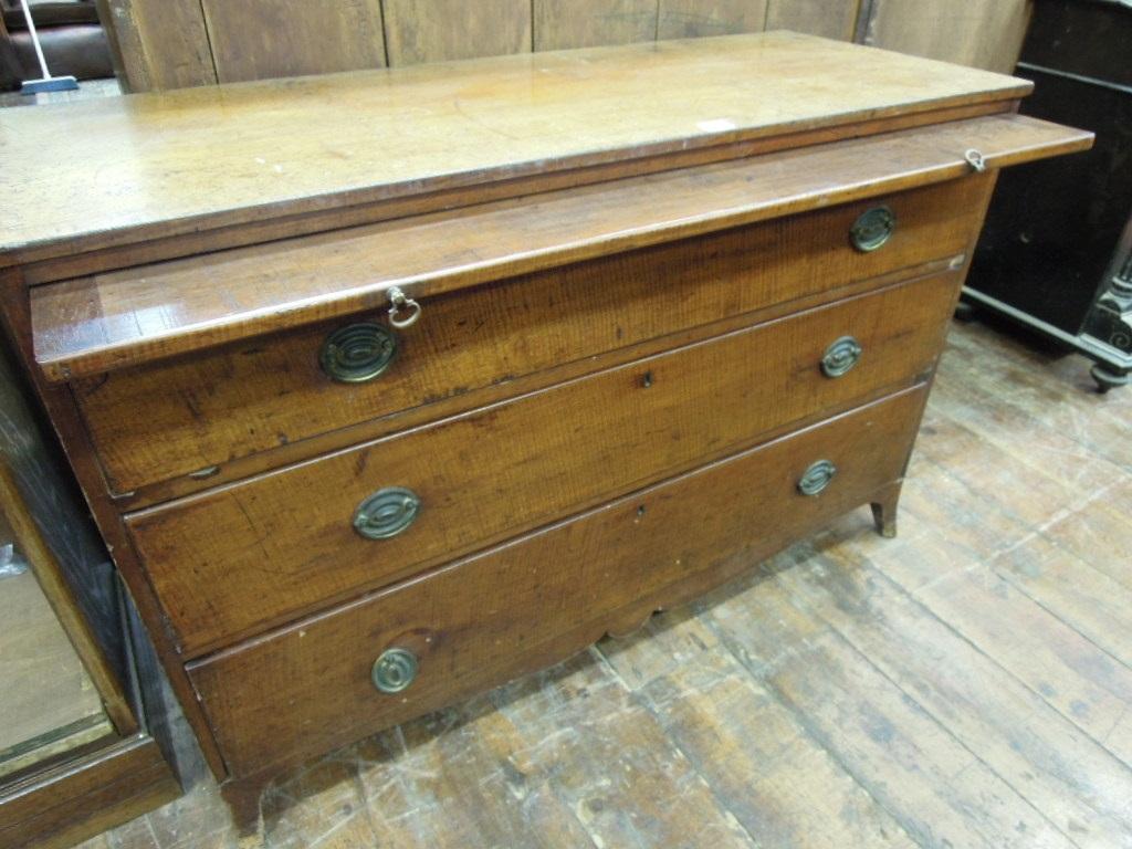 Appraisal: An early th century mahogany chest fitted with a brushing