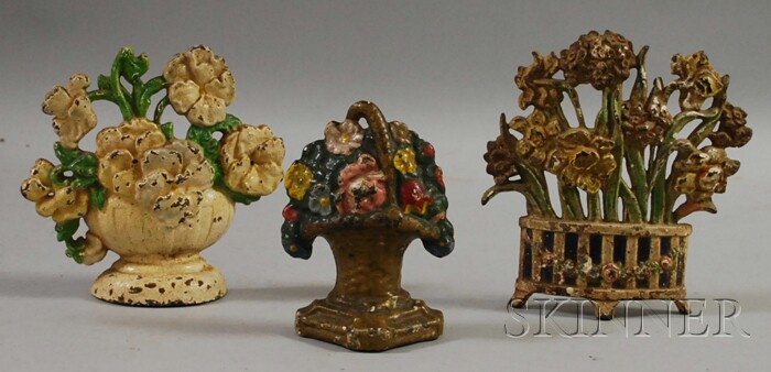 Appraisal: Three Polychrome-painted Cast Iron Floral Doorstops early th century one