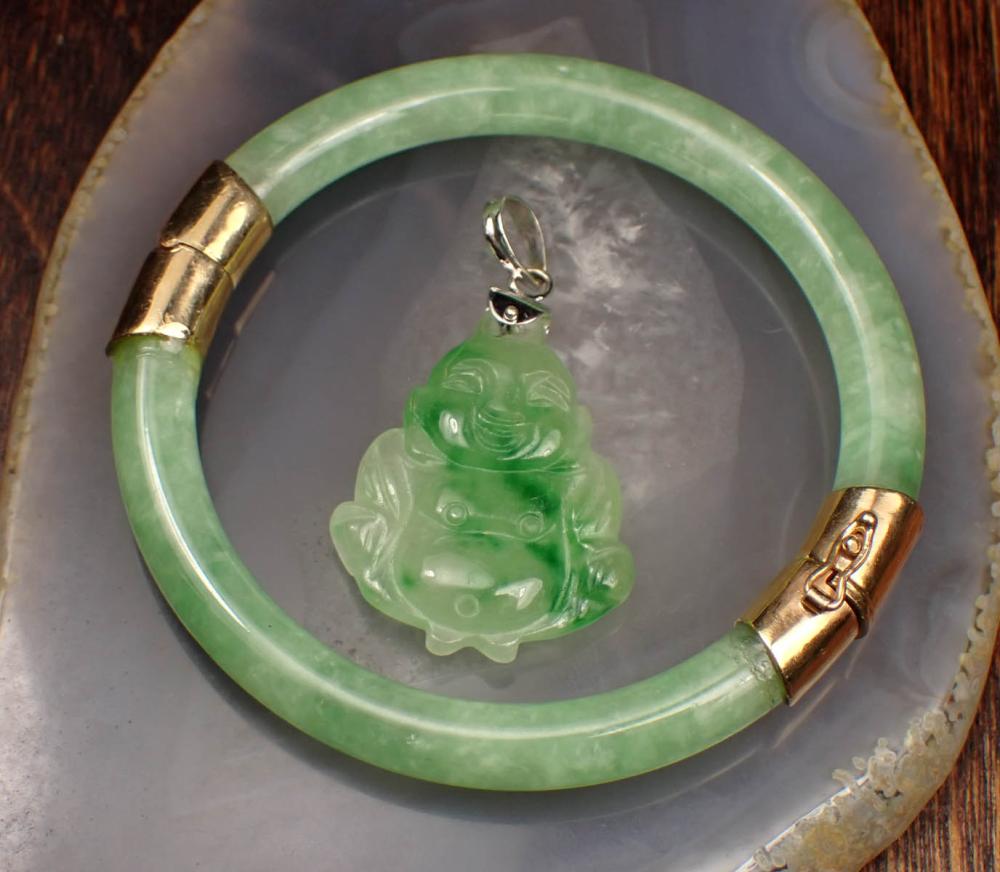 Appraisal: TWO ARTICLES OF GREEN JADE JEWELRY including a small round