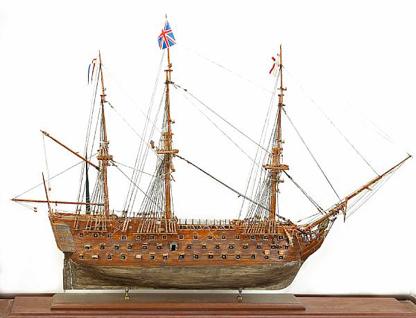 Appraisal: A carved and stained wood model of a British th