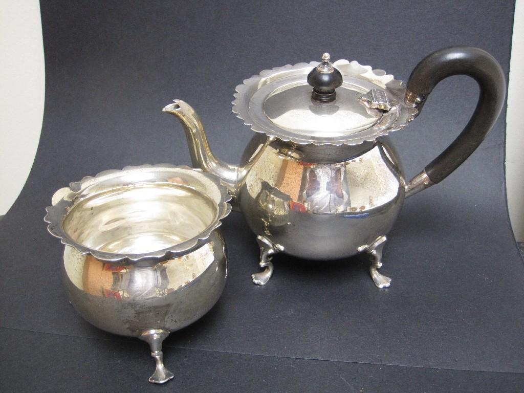 Appraisal: A George V circular Teapot and Sugar Bowl on shaped