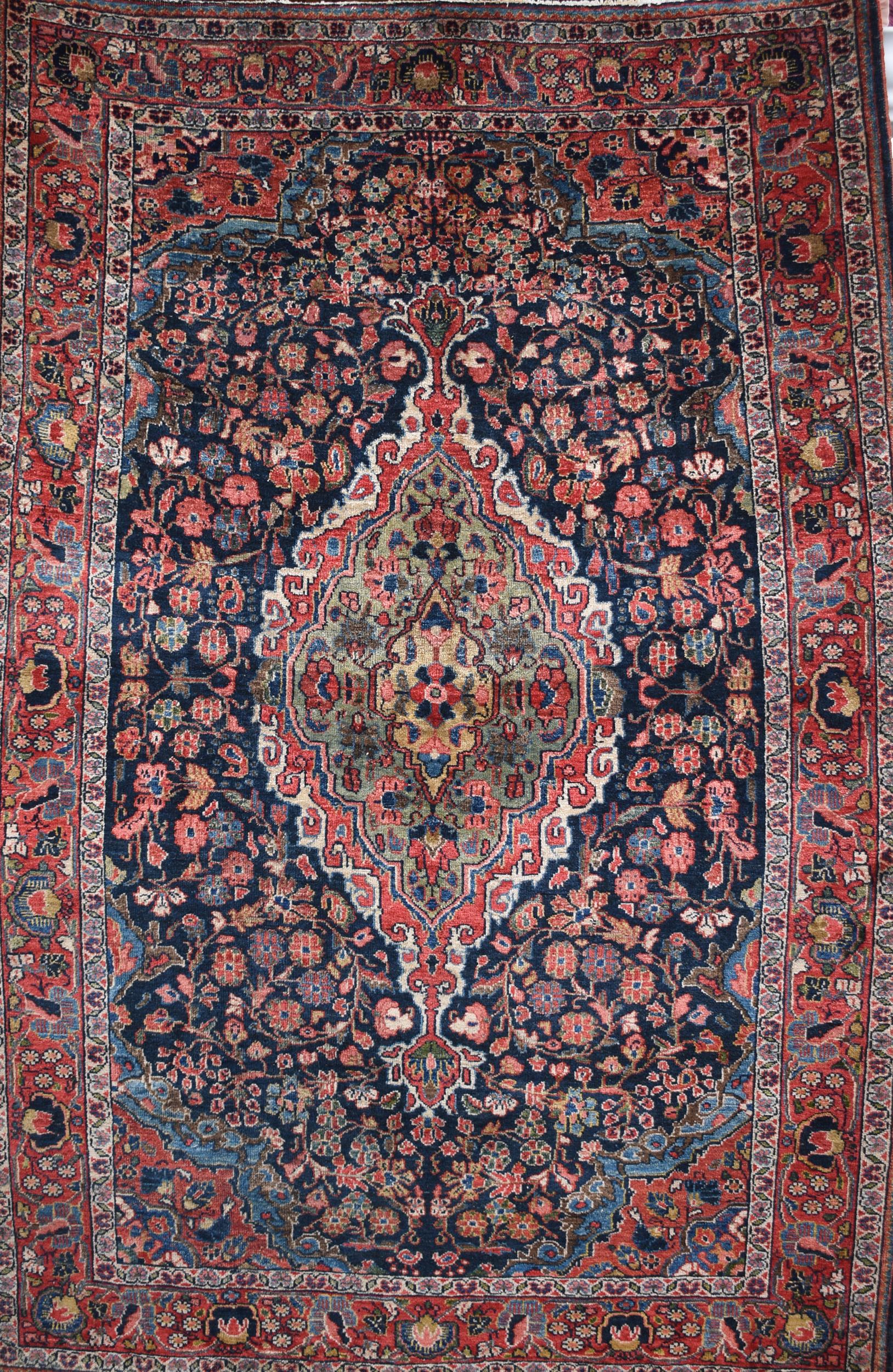 Appraisal: ANTIQUE SAROUK ORIENTAL SCATTER RUG Ca s Sarouk scatter rug