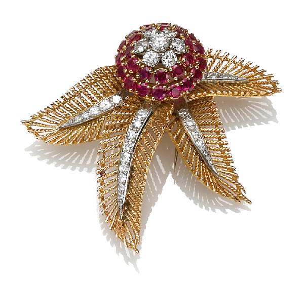 Appraisal: A diamond ruby and bicolor eighteen karat gold brooch Boucheron