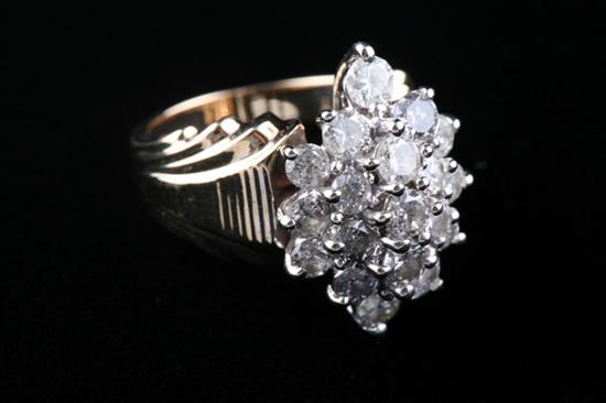 Appraisal: K YELLOW AND WHITE GOLD AND DIAMOND COCKTAIL RING Navette