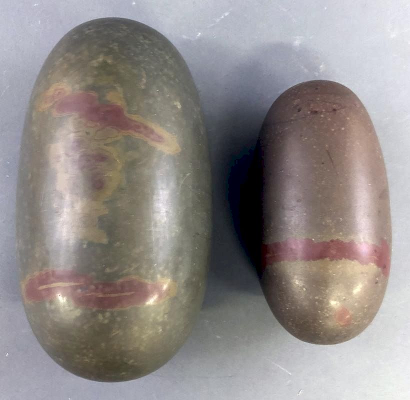 Appraisal: Two Shiva Lingam Stones Two Shiva Lingam stones natural shaped