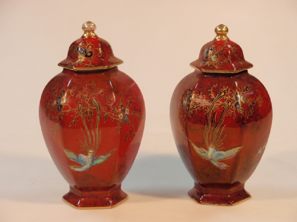 Appraisal: A pair of Wilton ware hexagonal ovoid vases and covers