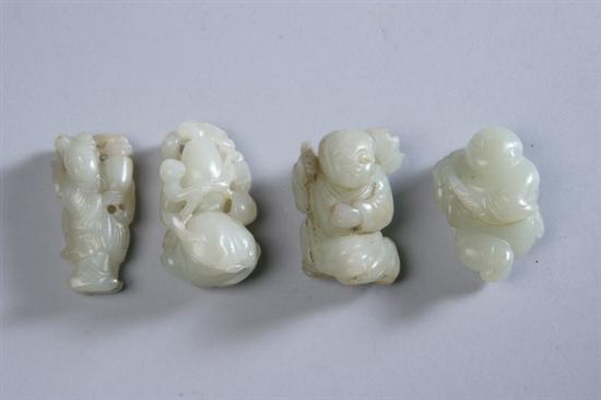 Appraisal: FOUR CHINESE CELADON JADE CARVINGS Late th century Carved to