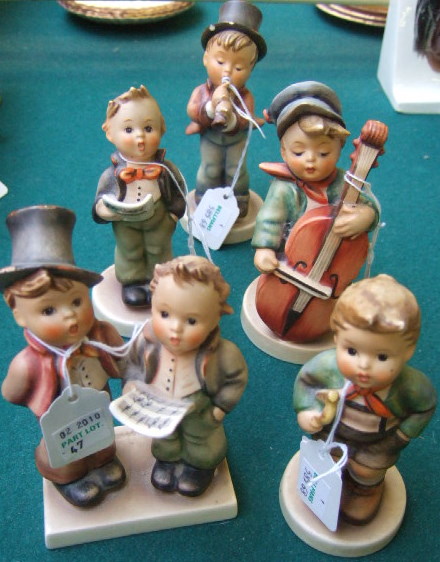 Appraisal: Five Hummel figures including two young boys in top hats