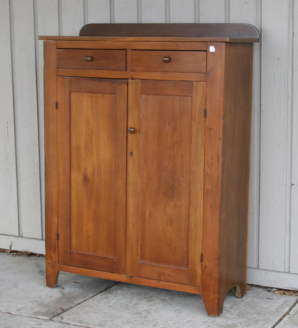 Appraisal: Primitive mixed woods jelly cabinet two drawers above two doors