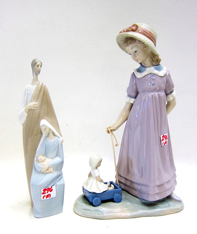 Appraisal: TWO LLADRO PORCELAIN FIGURES young girl pulling wagon with doll