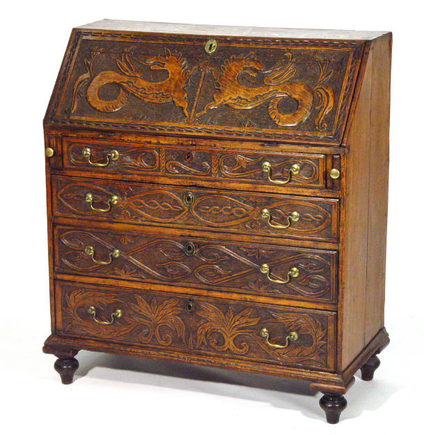 Appraisal: Victorian oak bureau the fall carved with griffins and enclosed