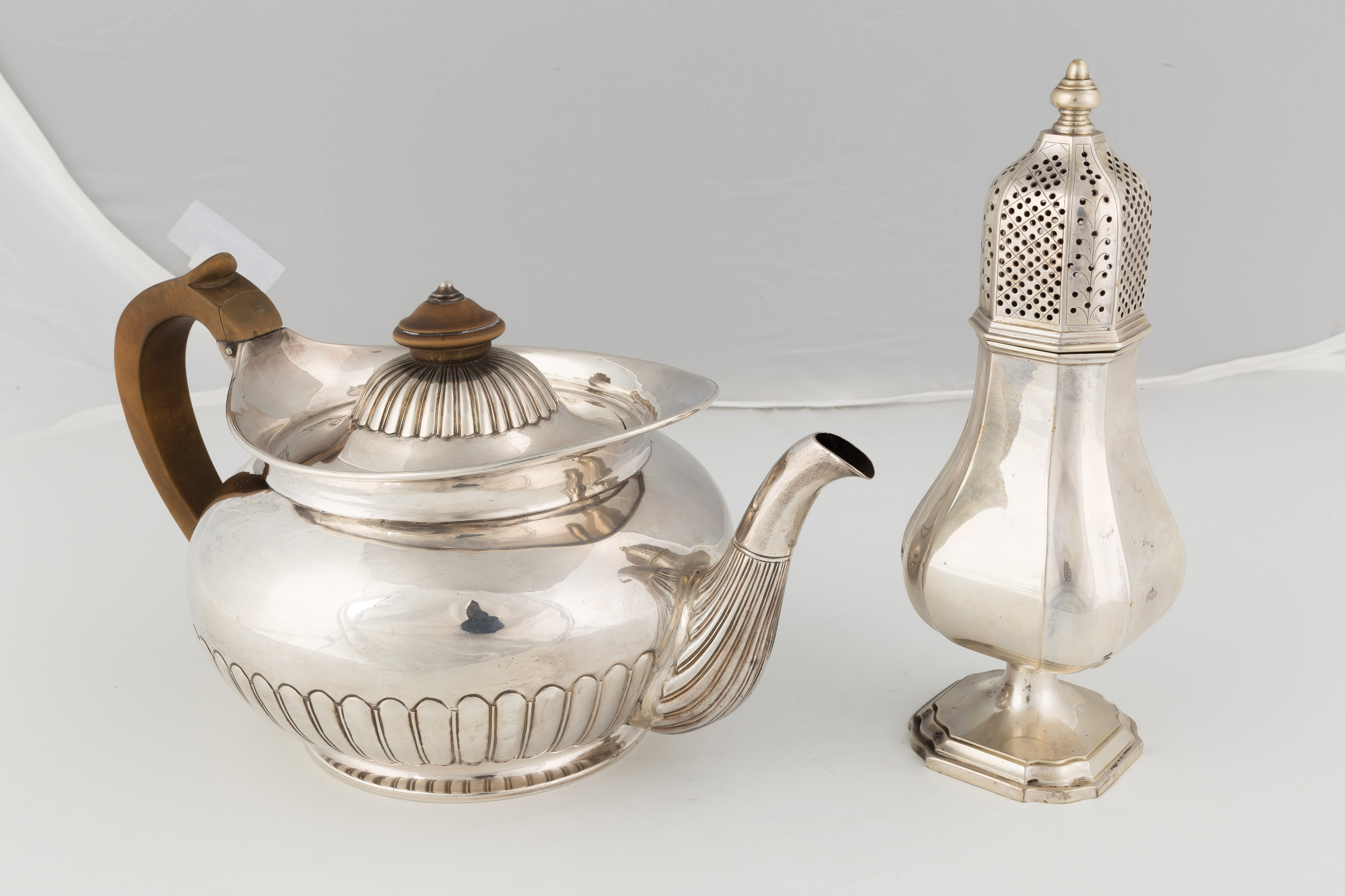 Appraisal: Sterling Silver Tea Pot and Castor Fluted tea pot Edinburgh