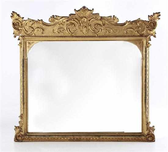 Appraisal: Victorian giltwood overmantel mirror mid th century shaped frieze with