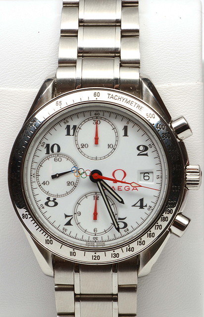 Appraisal: AN OMEGA OLYMPIC GENTLEMAN'S CHRONOGRAPH in stainless steel case and