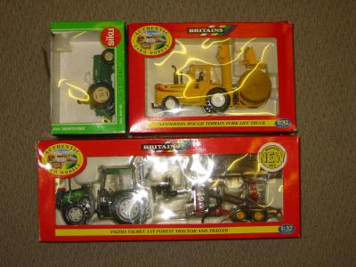 Appraisal: Britains Valtra Valmet Forest Tractor and Trailer and Siku Tractor