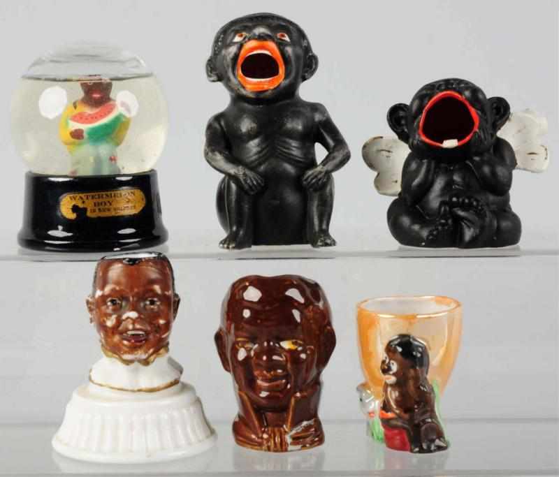 Appraisal: Lot of Black Americana Figures Includes one snow globe Condition