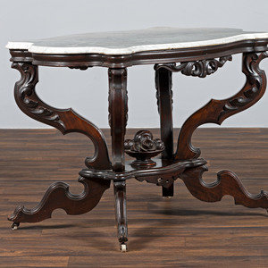 Appraisal: A Renaissance Revival Carved Walnut Marble Top Center Table Late