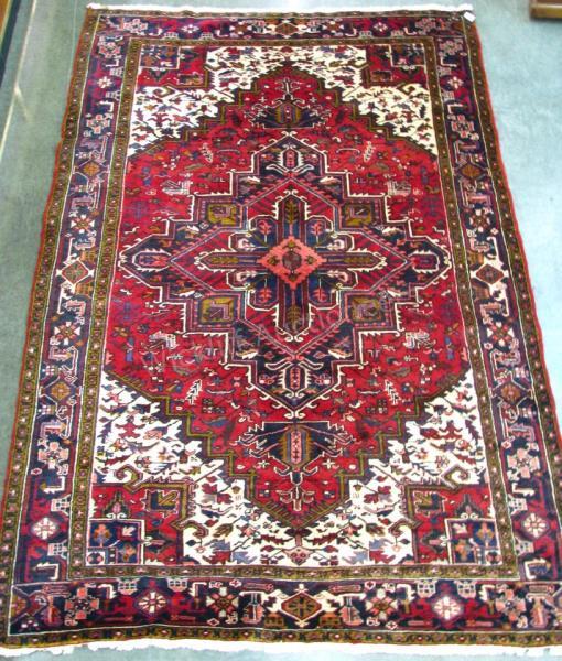 Appraisal: Handmade Oriental traditional Persian design navy and red field with