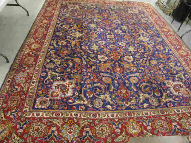 Appraisal: Tabriz Persian Handmade Rug elaborate floral on blue field '