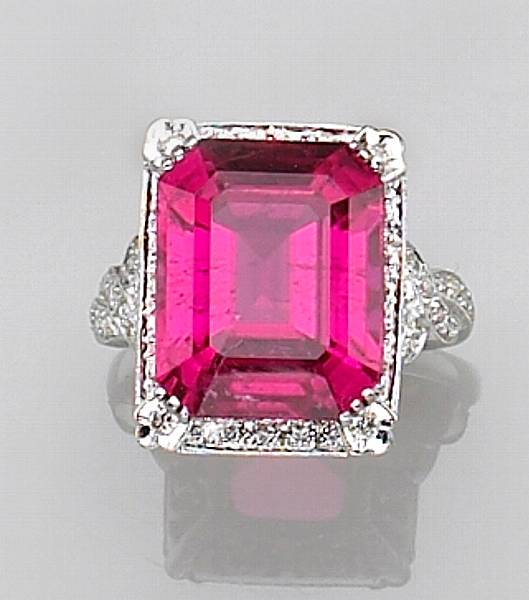 Appraisal: the ring featuring an emerald-cut pink tourmaline weighing carats framed