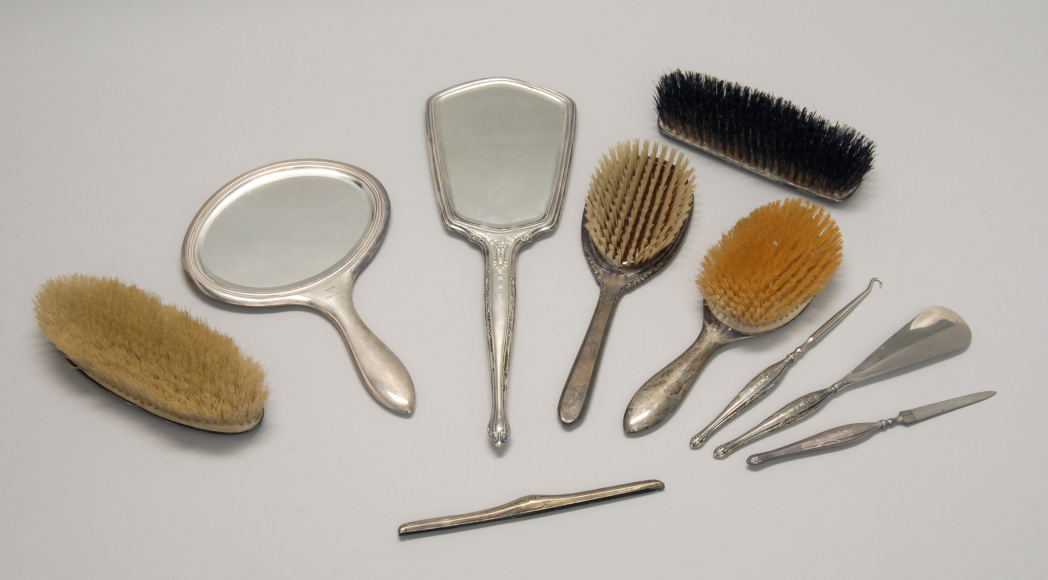 Appraisal: ASSORTED STERLING SILVER DRESSER ITEMS Including two hair brushes two