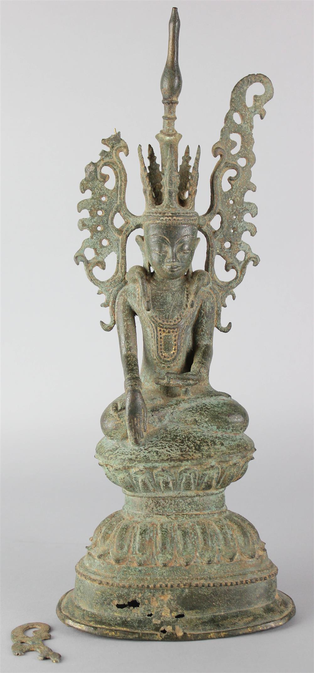 Appraisal: BURMESE BRONZE SEATED BUDDHA th century the seated deity with