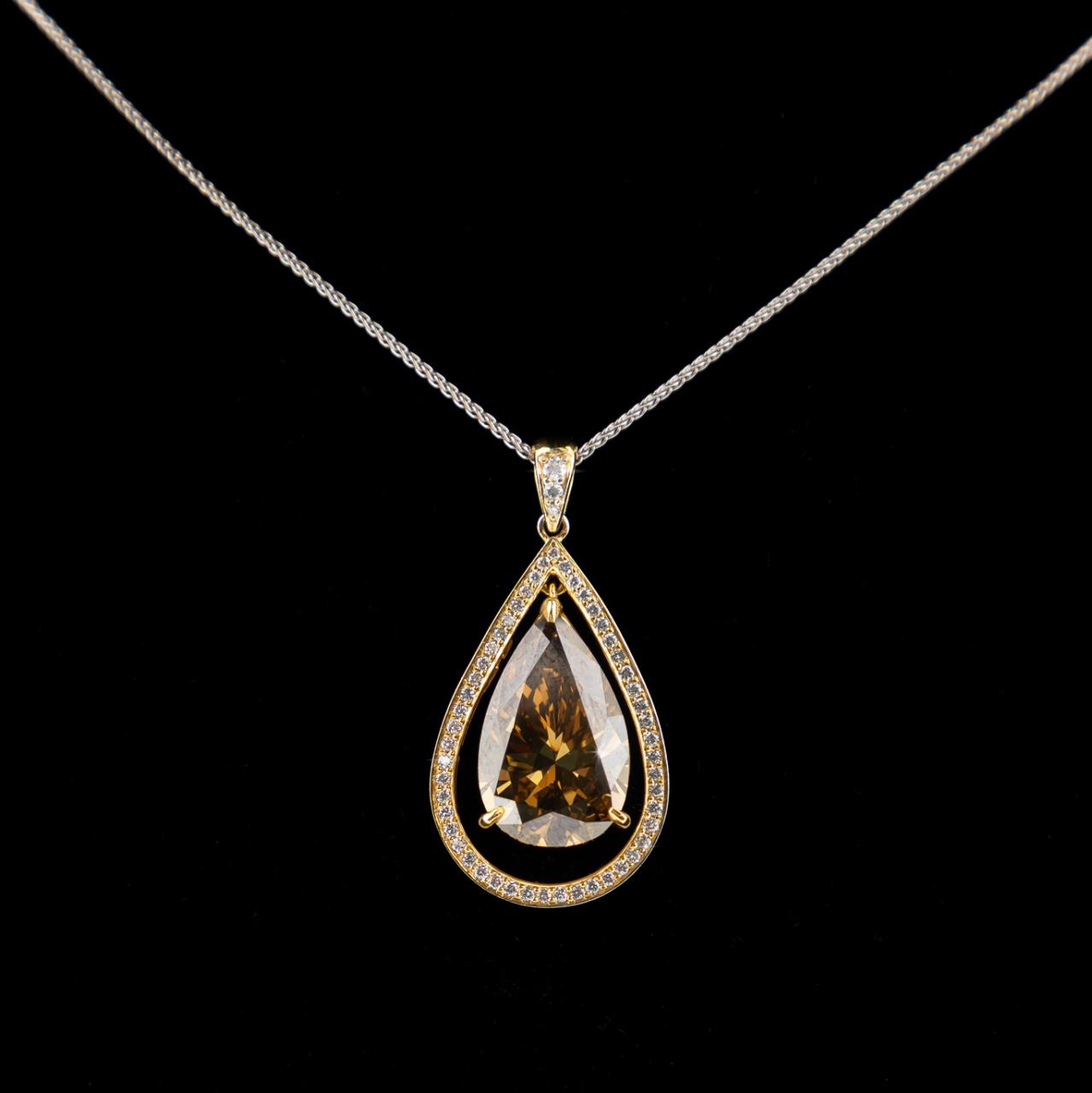 Appraisal: CT COGNAC DIAMOND PLAT K GOLD PENDANT Neiman Marcus ct