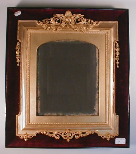 Appraisal: A Victorian picture frame formed by a velvet and glazed