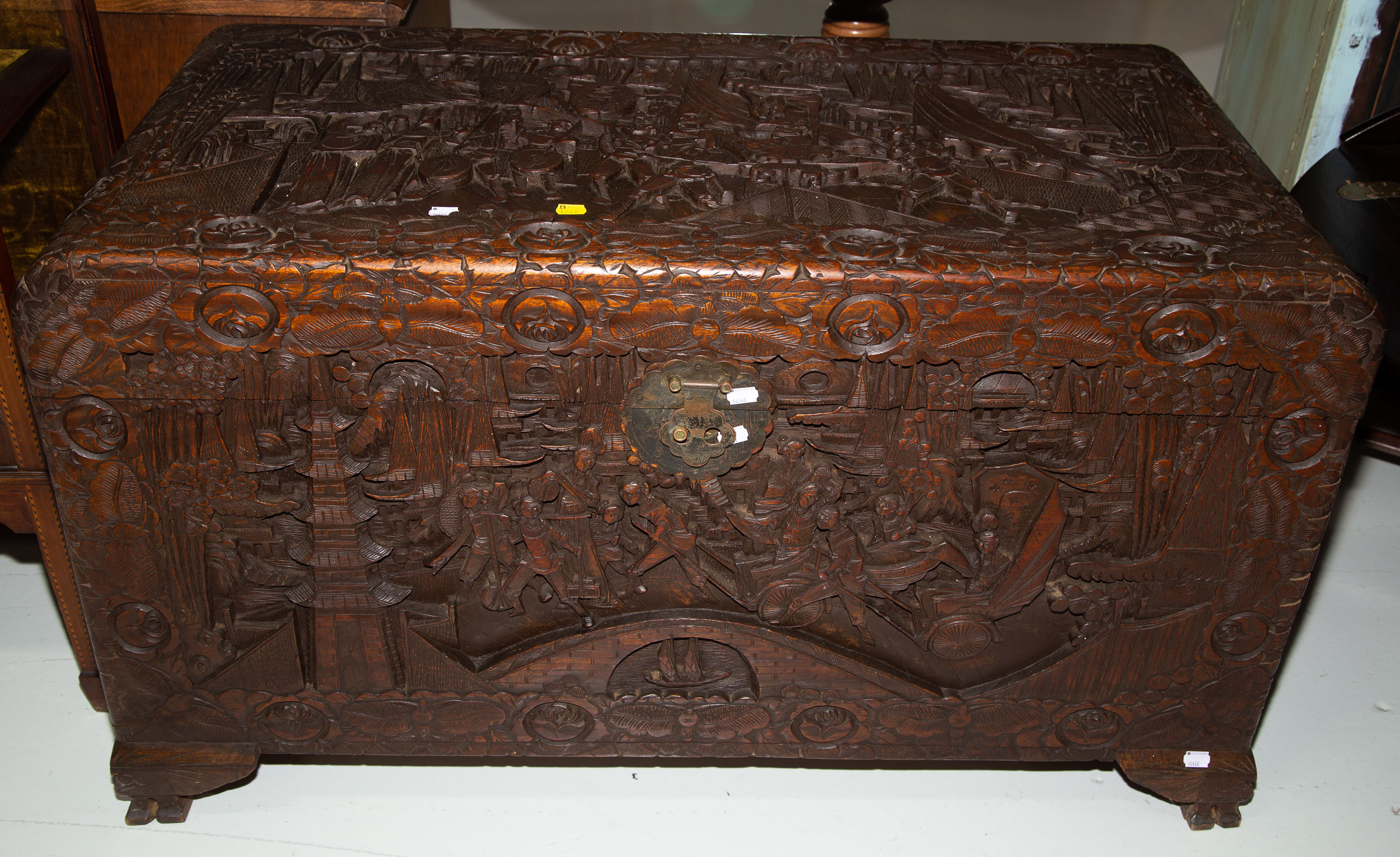 Appraisal: CHINESE CARVED CAMPHORWOOD BLANKET CHEST st half th century heavily