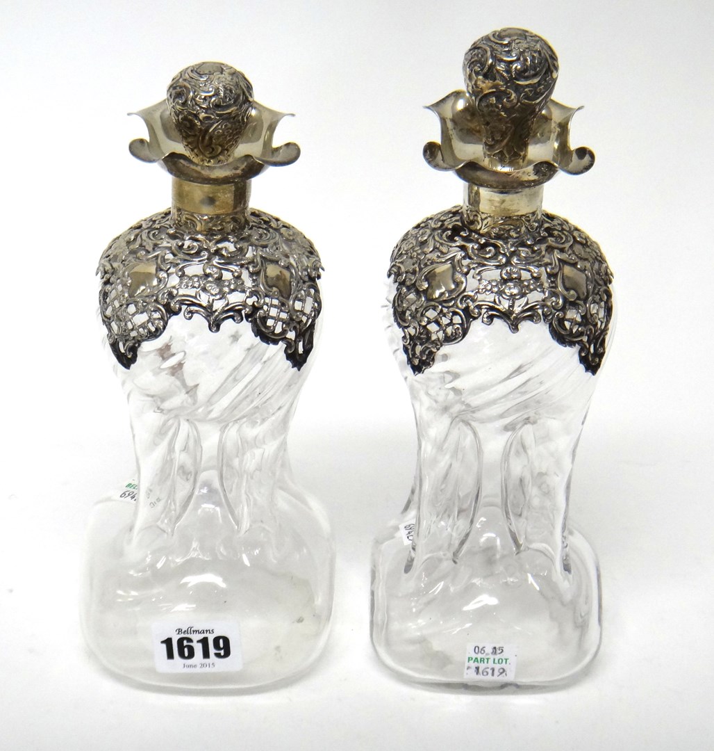 Appraisal: Two similar silver mounted dimpled moulded glass decanters each mount