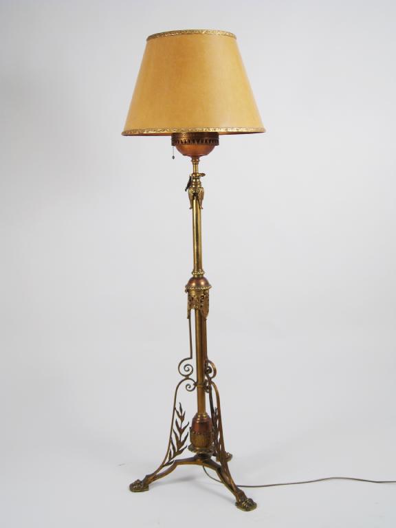 Appraisal: A brass and copper adjustable Standard Lamp and Shade with