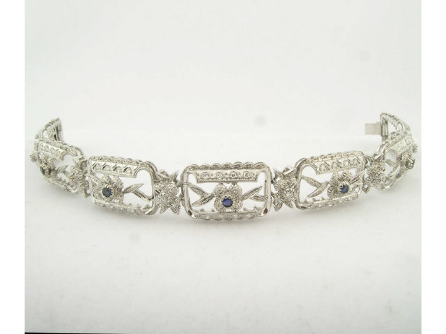 Appraisal: K white gold hand assembled diamond and sapphire bracelet with