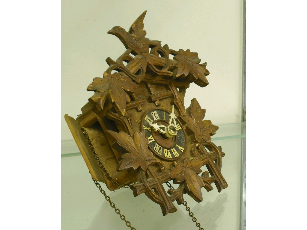 Appraisal: Miniature Black Forest wall clock the dial within a chalet