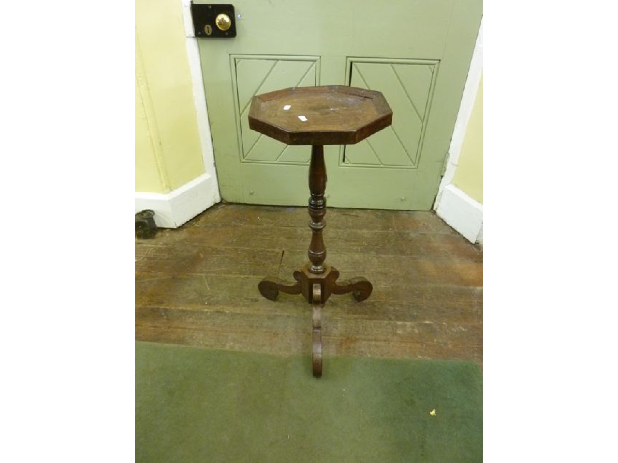 Appraisal: A Georgian occasional table in walnut and other timbers the