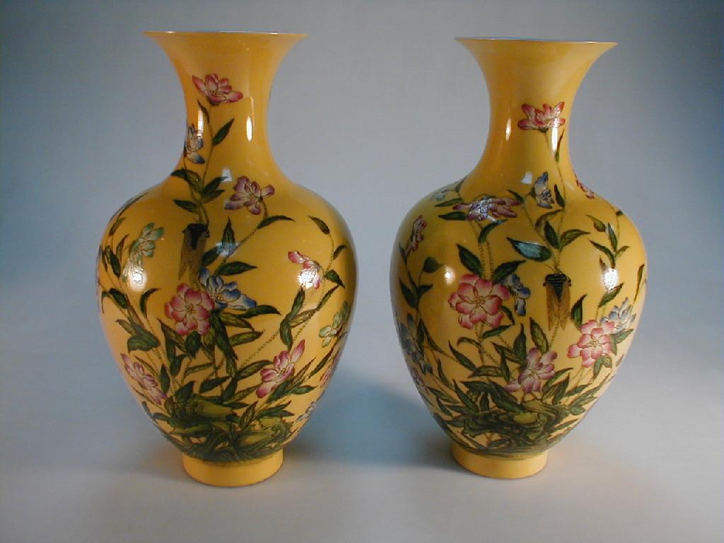 Appraisal: A pair of Chinese baluster vases with everted rims enamelled