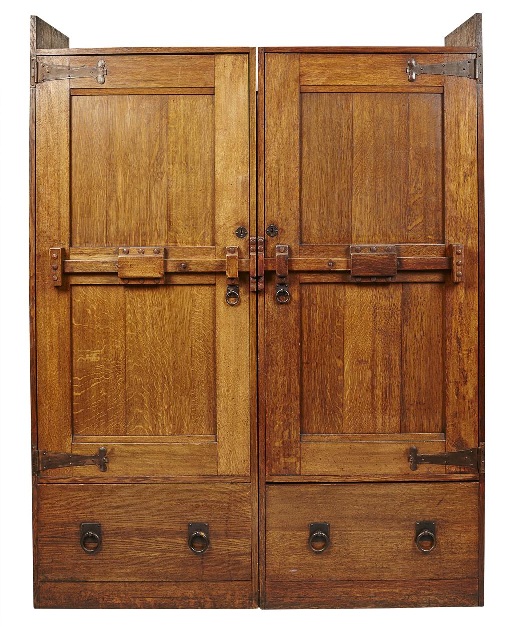 Appraisal: WYLIE LOCHHEAD GLASGOW ARTS CRAFTS OAK WARDROBE CIRCA with twin