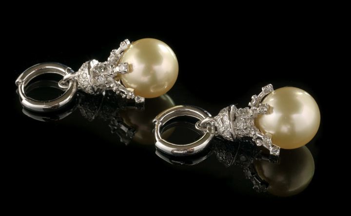 Appraisal: Rare Pair of Fourteen-Karat White Gold Golden South Seas Pearl