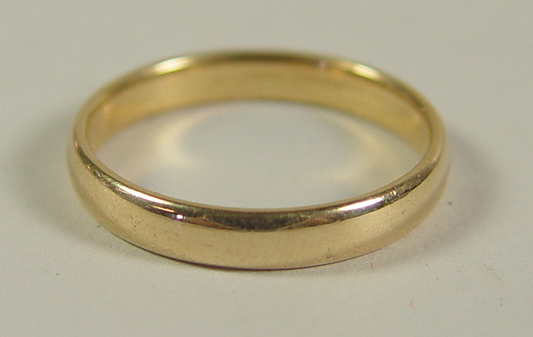 Appraisal: k Yellow Gold Wedding Band Polished plain wedding band in