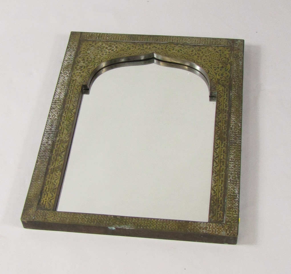 Appraisal: An Indian hardwood and brass inlaid wall mirror of window