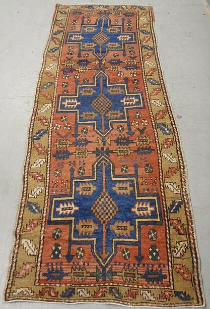 Appraisal: - Heriz oriental hall runner with rose field and three