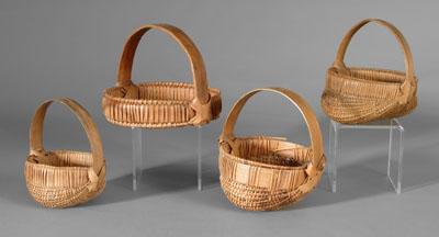 Appraisal: Four miniature oak split baskets all with broad bentwood handles