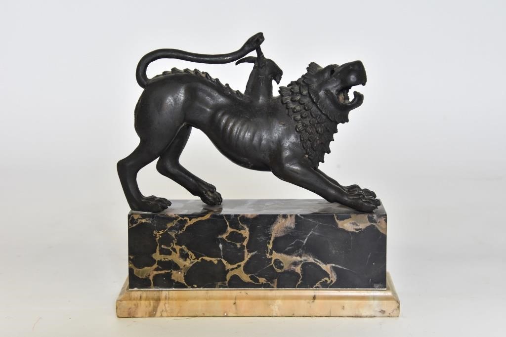 Appraisal: Bronze lion figure mounted on a black marble base h