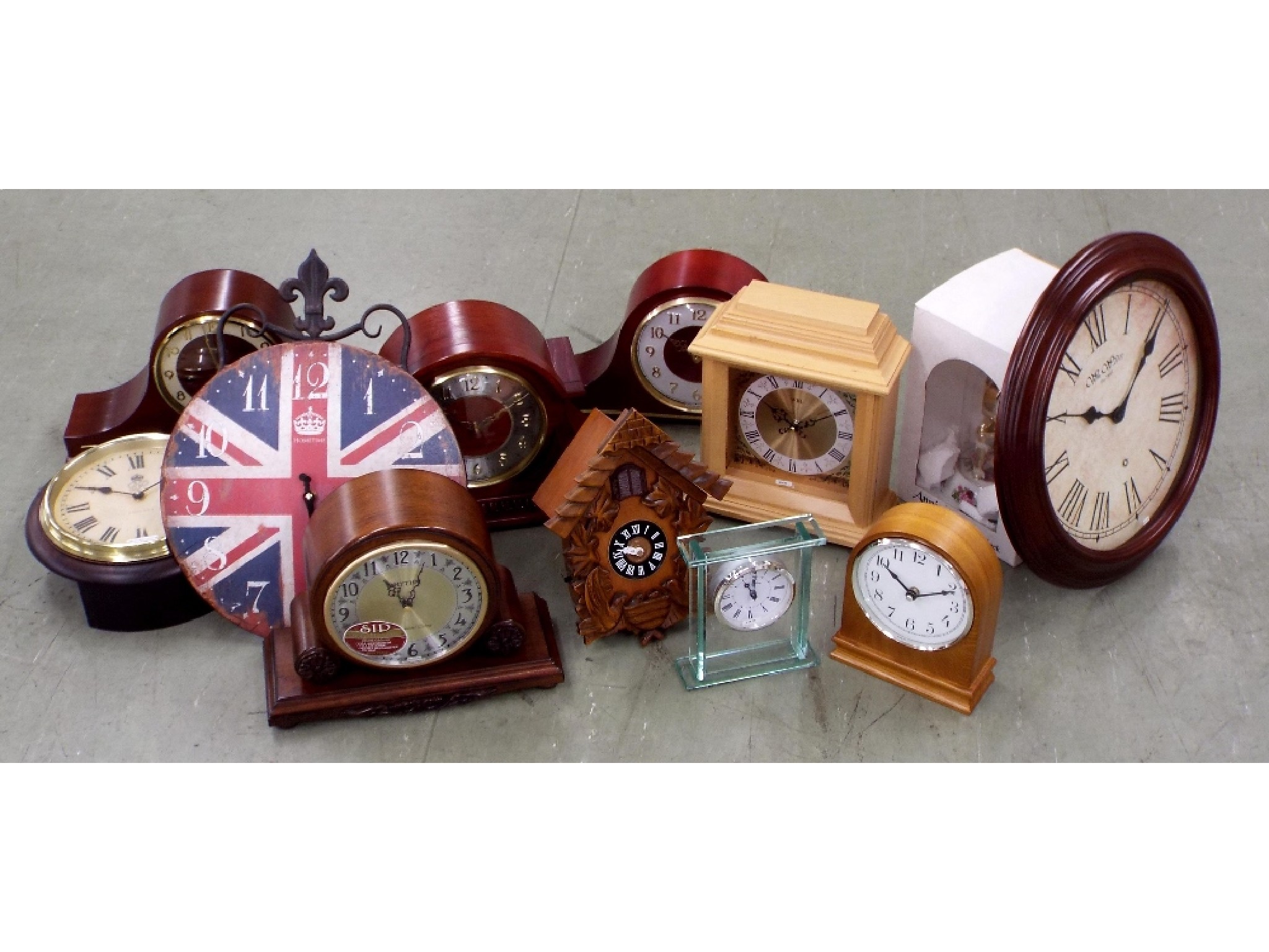 Appraisal: Eleven various new and boxed wall and mantel clocks