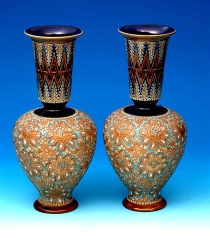 Appraisal: A pair of Royal Doulton Lambeth vases high