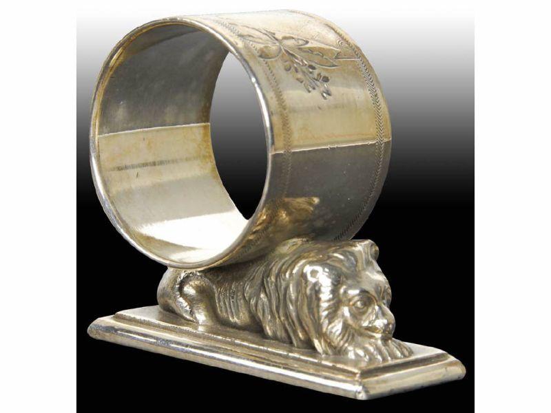 Appraisal: Small Lion Reclines On Base Figural Napkin Ring Description No